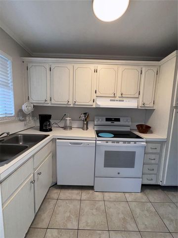 300 Layne Blvd 303, Hallandale Beach, FL 33009