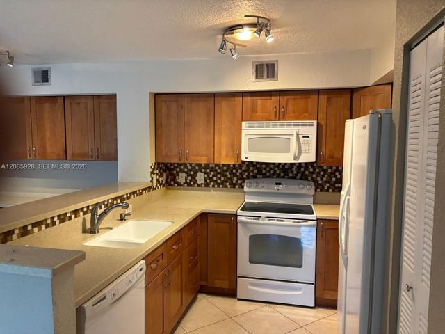 1721 Village Boulevard 205, West Palm Beach, FL 33409