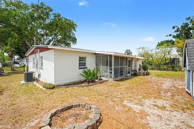 7815 N WOODLYNNE AVENUE, Tampa, FL 33614