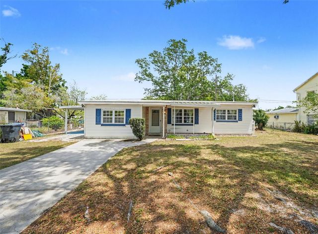 7815 N WOODLYNNE AVENUE, Tampa, FL 33614