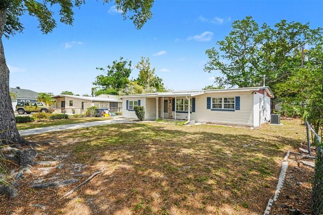 7815 N WOODLYNNE AVENUE, Tampa, FL 33614