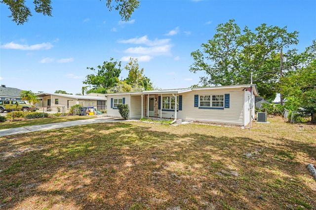 7815 N WOODLYNNE AVENUE, Tampa, FL 33614