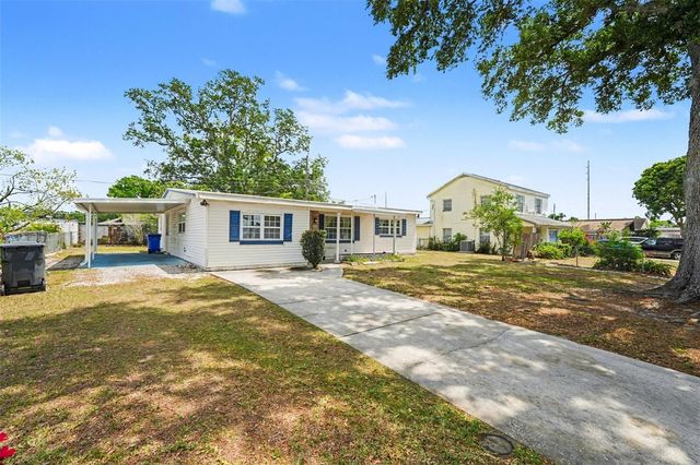 7815 N WOODLYNNE AVENUE, Tampa, FL 33614