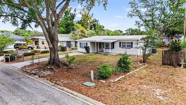 7815 N WOODLYNNE AVENUE, Tampa, FL 33614