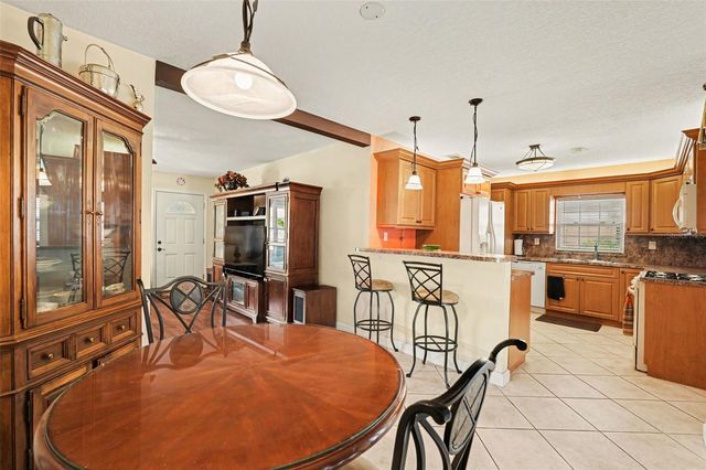 7815 N WOODLYNNE AVENUE, Tampa, FL 33614