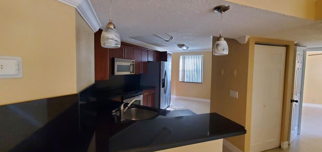 8781 Wiles Road 202, Coral Springs, FL 33067