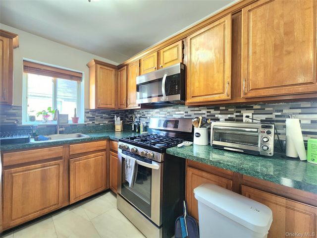 93-05 91st Avenue, Woodhaven, NY 11421