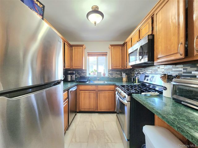 93-05 91st Avenue, Woodhaven, NY 11421