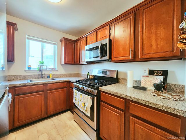 93-05 91st Avenue, Woodhaven, NY 11421