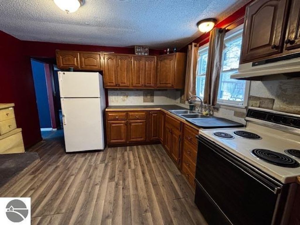 Image 3 of property listing at 7102 S M-88, Bellaire, MI 49615