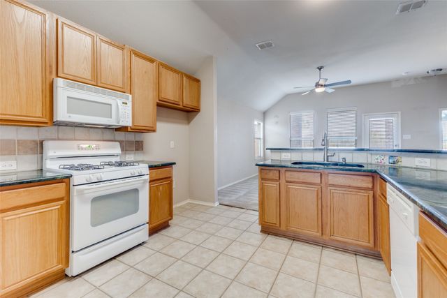 9421 Links Fairway Drive, Rowlett, TX 75089