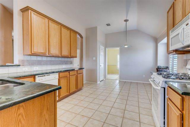 9421 Links Fairway Drive, Rowlett, TX 75089