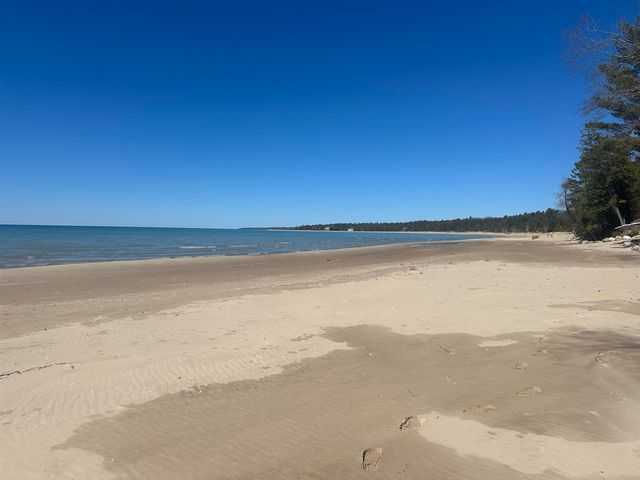 1995 San Marino Trail, Kewadin, MI 49648