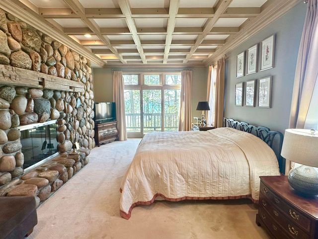 1995 San Marino Trail, Kewadin, MI 49648