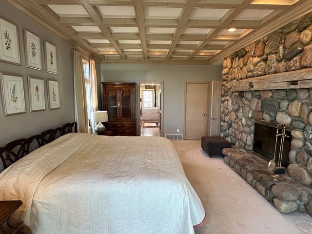 1995 San Marino Trail, Kewadin, MI 49648