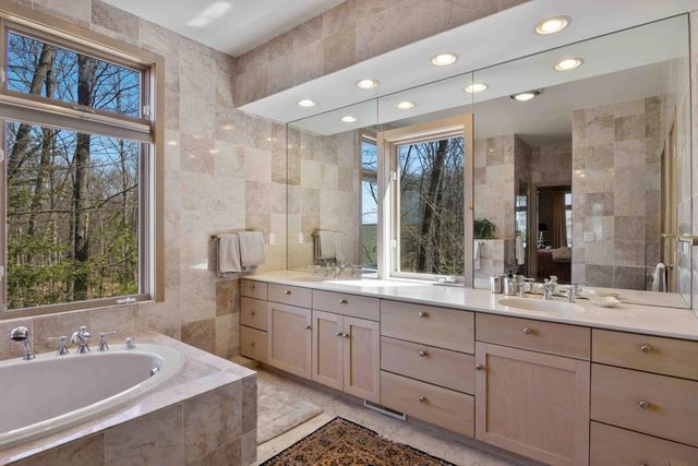 1995 San Marino Trail, Kewadin, MI 49648