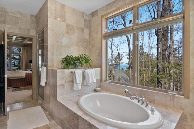 1995 San Marino Trail, Kewadin, MI 49648