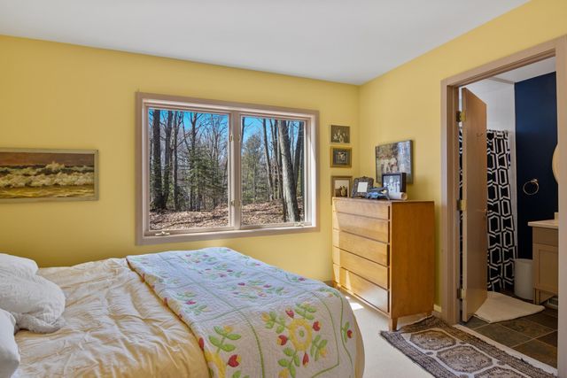 1995 San Marino Trail, Kewadin, MI 49648