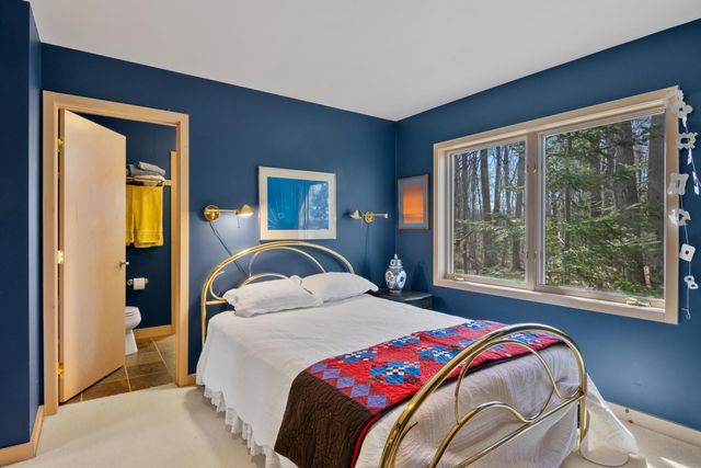 1995 San Marino Trail, Kewadin, MI 49648