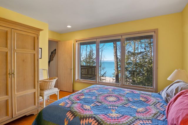 1995 San Marino Trail, Kewadin, MI 49648