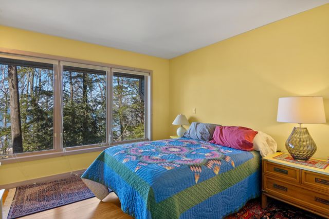 1995 San Marino Trail, Kewadin, MI 49648