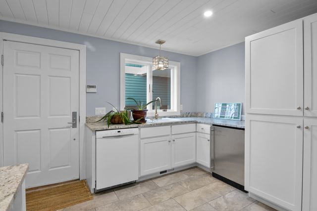 1995 San Marino Trail, Kewadin, MI 49648