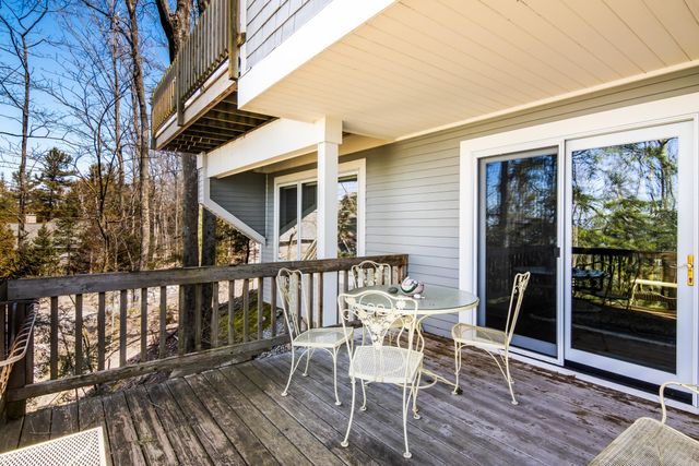 1995 San Marino Trail, Kewadin, MI 49648