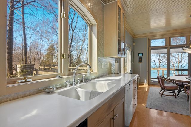 1995 San Marino Trail, Kewadin, MI 49648