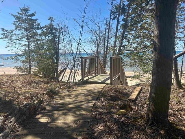 1995 San Marino Trail, Kewadin, MI 49648