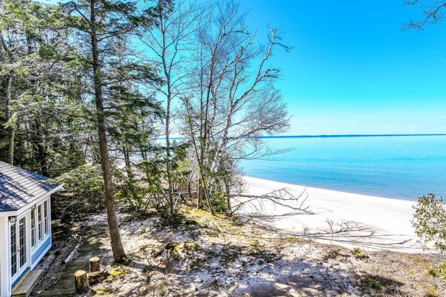 1995 San Marino Trail, Kewadin, MI 49648