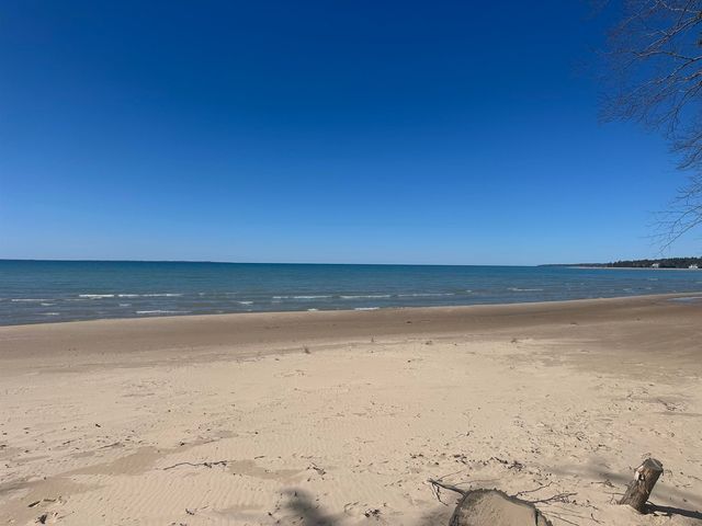 1995 San Marino Trail, Kewadin, MI 49648