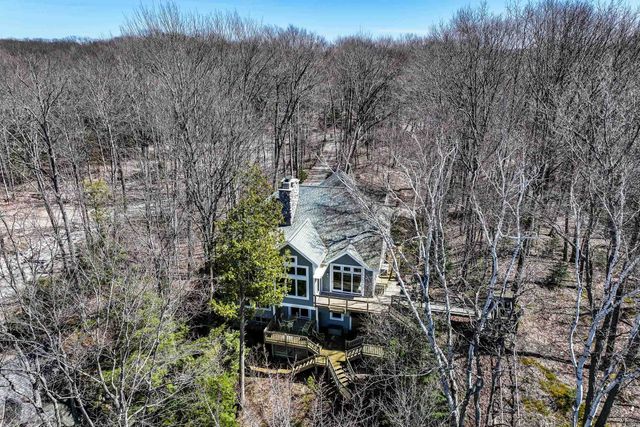 1995 San Marino Trail, Kewadin, MI 49648