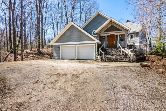 1995 San Marino Trail, Kewadin, MI 49648