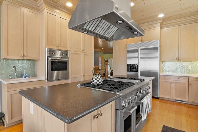 1995 San Marino Trail, Kewadin, MI 49648