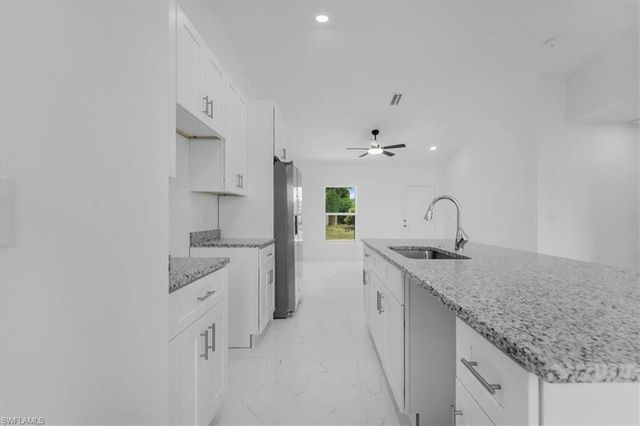 1816 Long Beach DR, Lehigh Acres, FL 33972