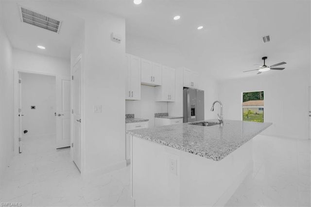 1816 Long Beach DR, Lehigh Acres, FL 33972