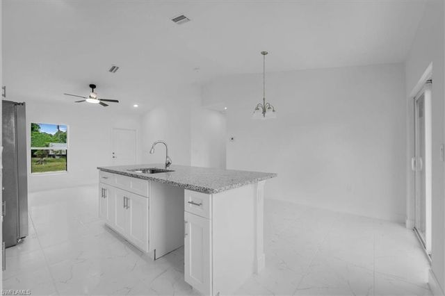 1816 Long Beach DR, Lehigh Acres, FL 33972