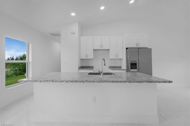 1816 Long Beach DR, Lehigh Acres, FL 33972