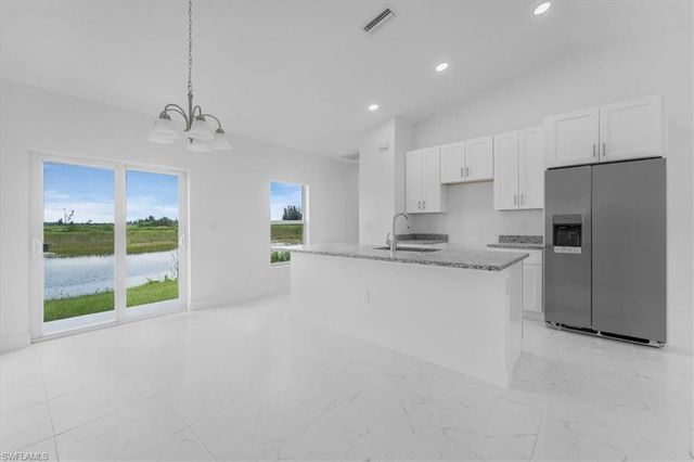 1816 Long Beach DR, Lehigh Acres, FL 33972