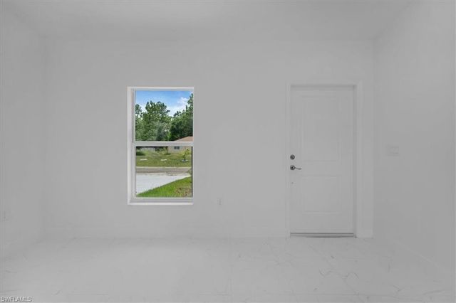 1816 Long Beach DR, Lehigh Acres, FL 33972