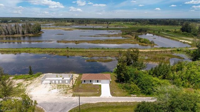1816 Long Beach DR, Lehigh Acres, FL 33972