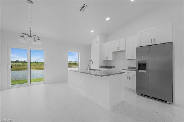 1816 Long Beach DR, Lehigh Acres, FL 33972