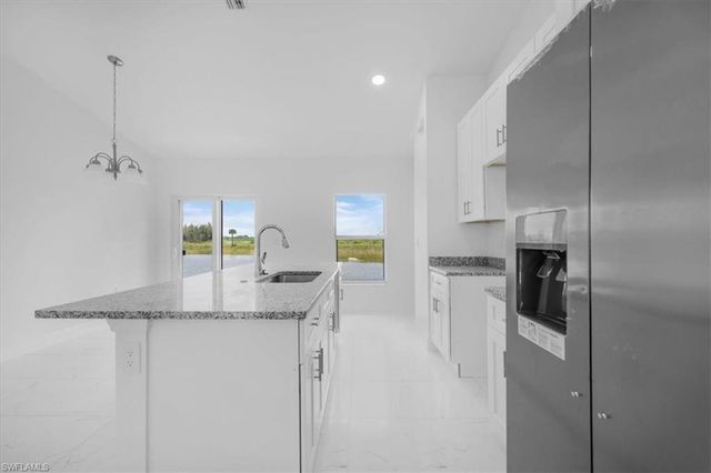 1816 Long Beach DR, Lehigh Acres, FL 33972