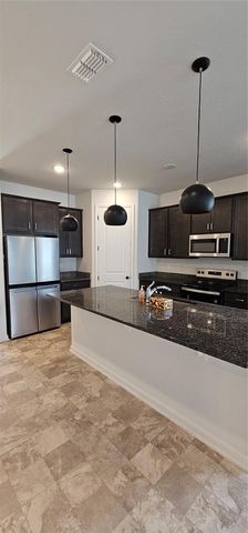 1220 MATTIE POINTE BOULEVARD, Auburndale, FL 33823