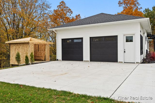 9465 Wabasis Pointe Drive, Greenville, MI 48838