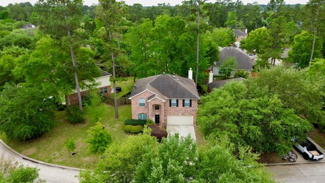 50 N Spinning Wheel Circle, The Woodlands, TX 77382