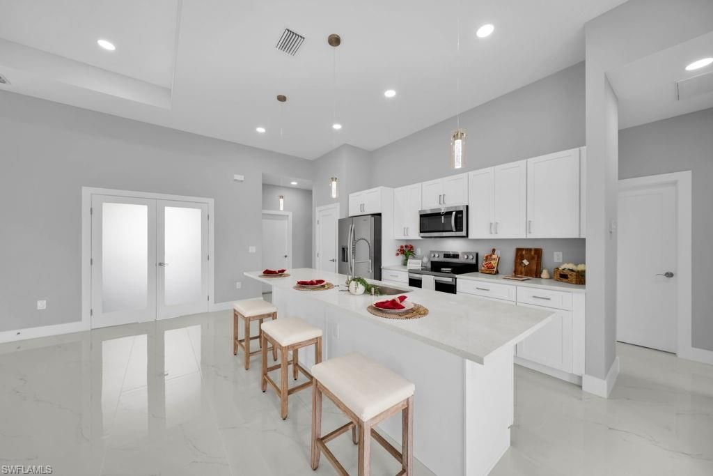 1426 NW 17th AVE, CAPE CORAL, FL 33993 — photo 4