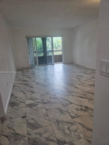 7707 Camino Real 310, Miami, FL 33143