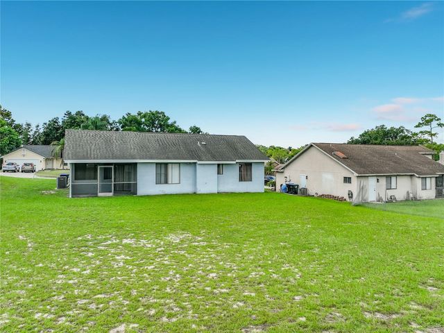 2943 ROUNDABOUT LANE, Orlando, FL 32818