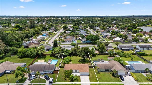 143 Bobwhite Road, Royal Palm Beach, FL 33411